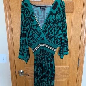 Green and black V-neck dress